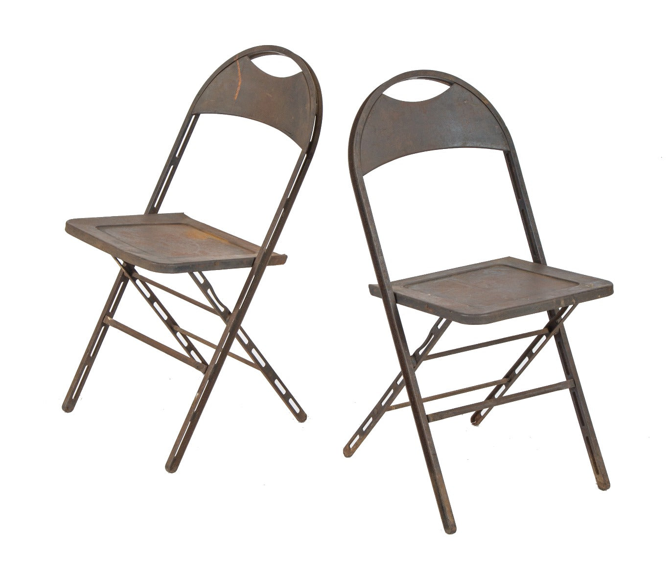 one of two pairs of original early 20th century perforated heavy gauge steel factory machine hall chairs with nicely aged patina