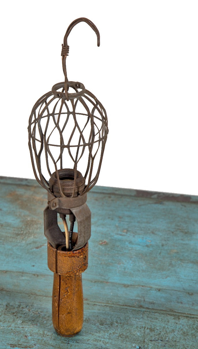 hard to find early 20th century american industrial trouble light with single socket and allover crazed turned wood handle