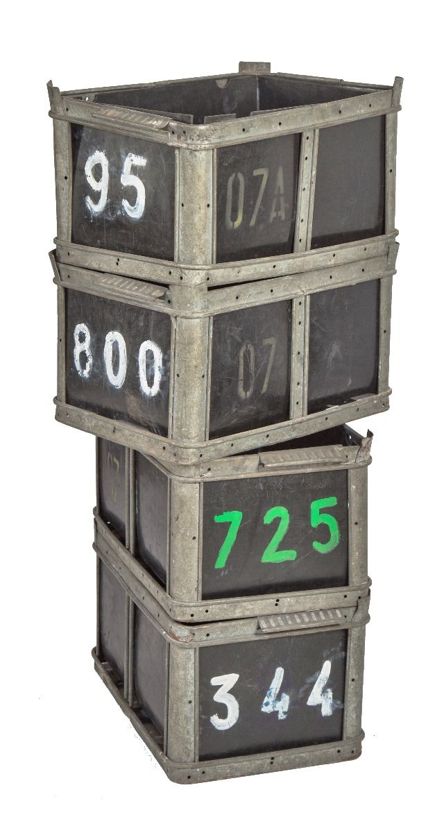four matching original vintage american industrial stackable metal and rubber salvaged chicago factory bins