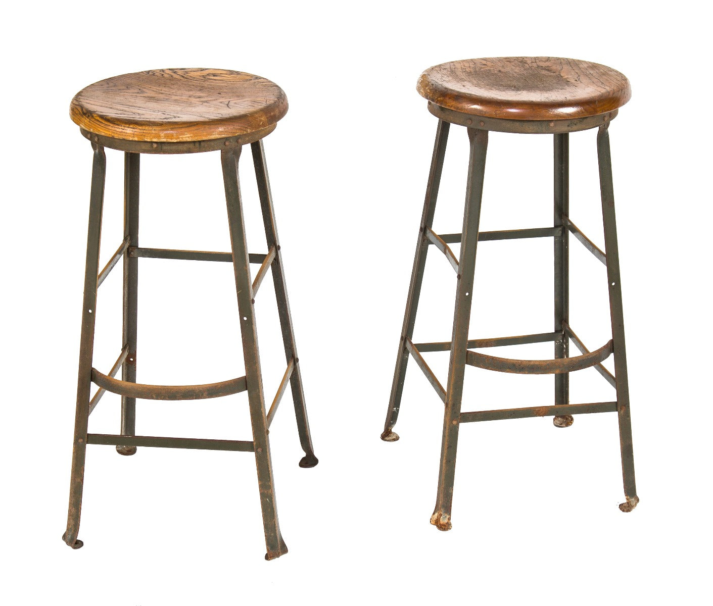 two matching vintage american industrial angled steel dietzgen stools with solid maple wood seats and foot rests