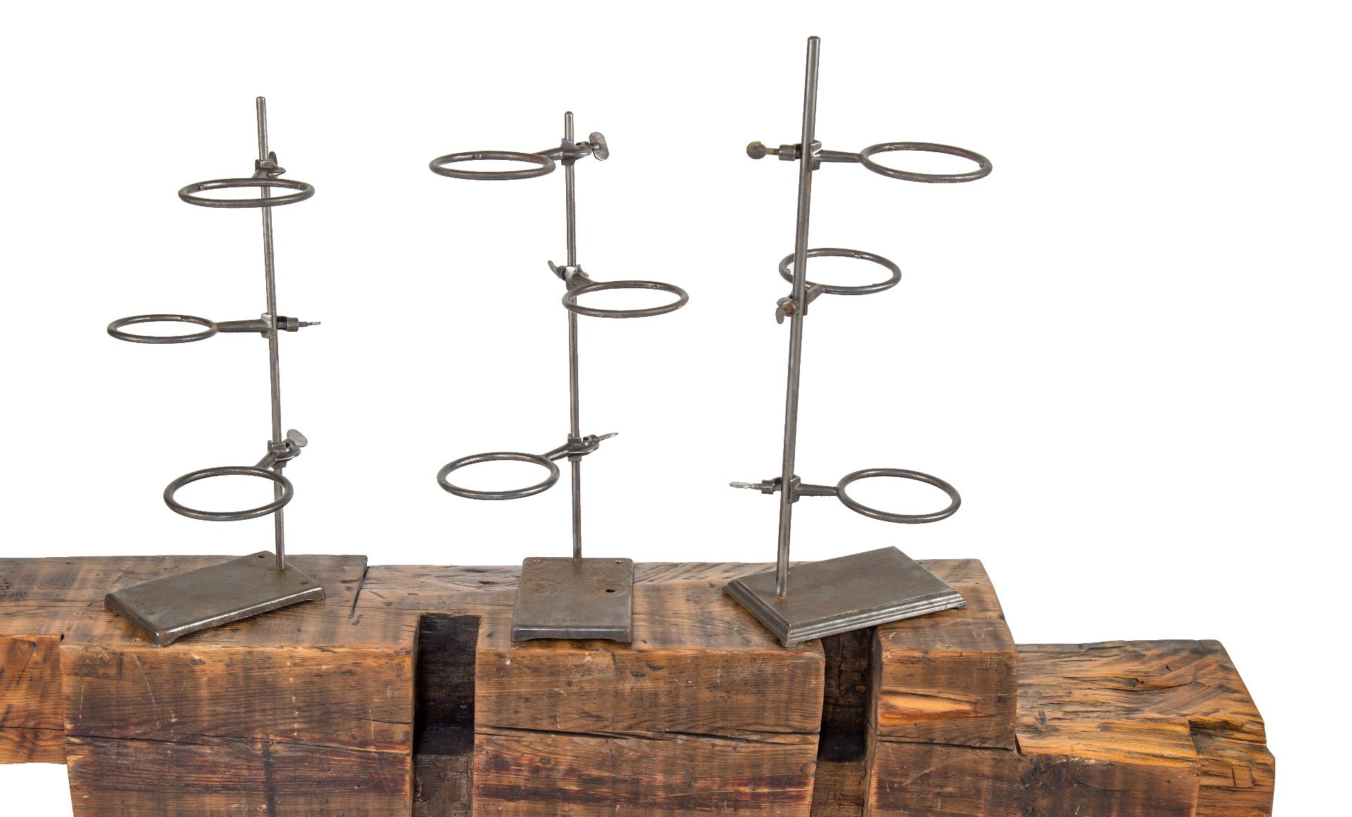 set of two nearly identical vintage industrial brushed metal laboratory stands with fully adjustable ring clamps