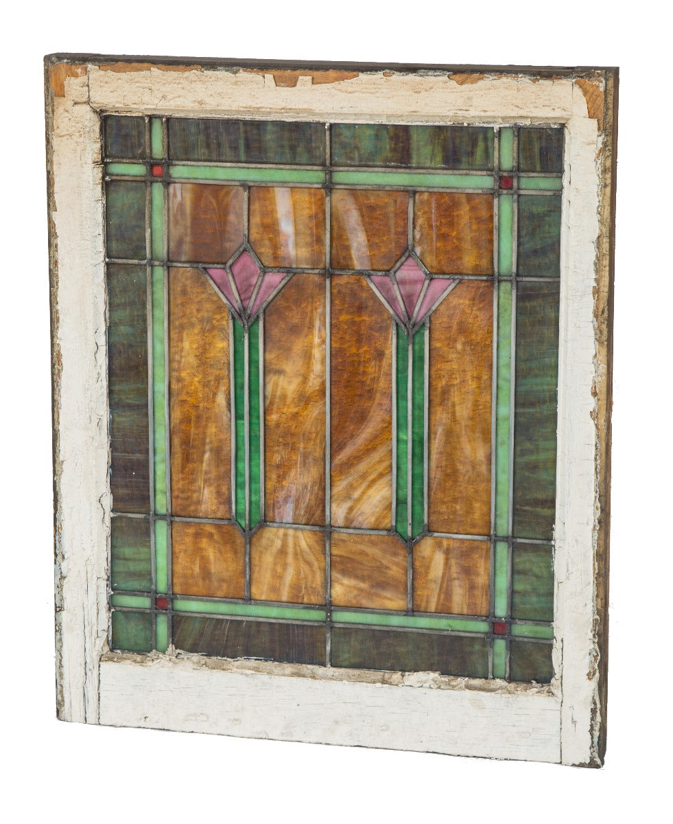 one of two completely intact and richly colored salvaged chicago bungalow windows with abstract floral motifs