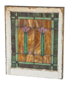 one of two completely intact and richly colored salvaged chicago bungalow windows with abstract floral motifs