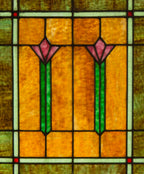 one of two completely intact and richly colored salvaged chicago bungalow windows with abstract floral motifs