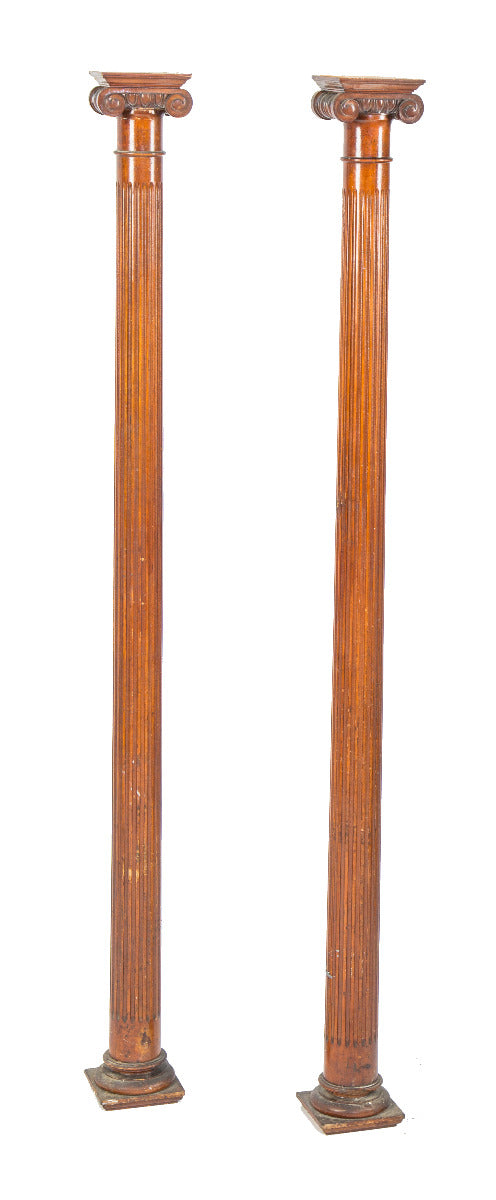 hard to find matching pair of solid cherry wood salvaged chicago fluted columns with richly ornamented ionic capitals
