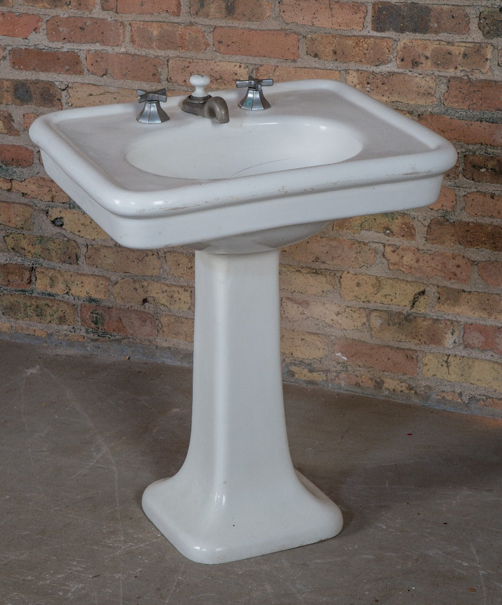 single late 19th or early 20th century vitreous enamel or "chinaware" residential lavatory sink with pedestal base