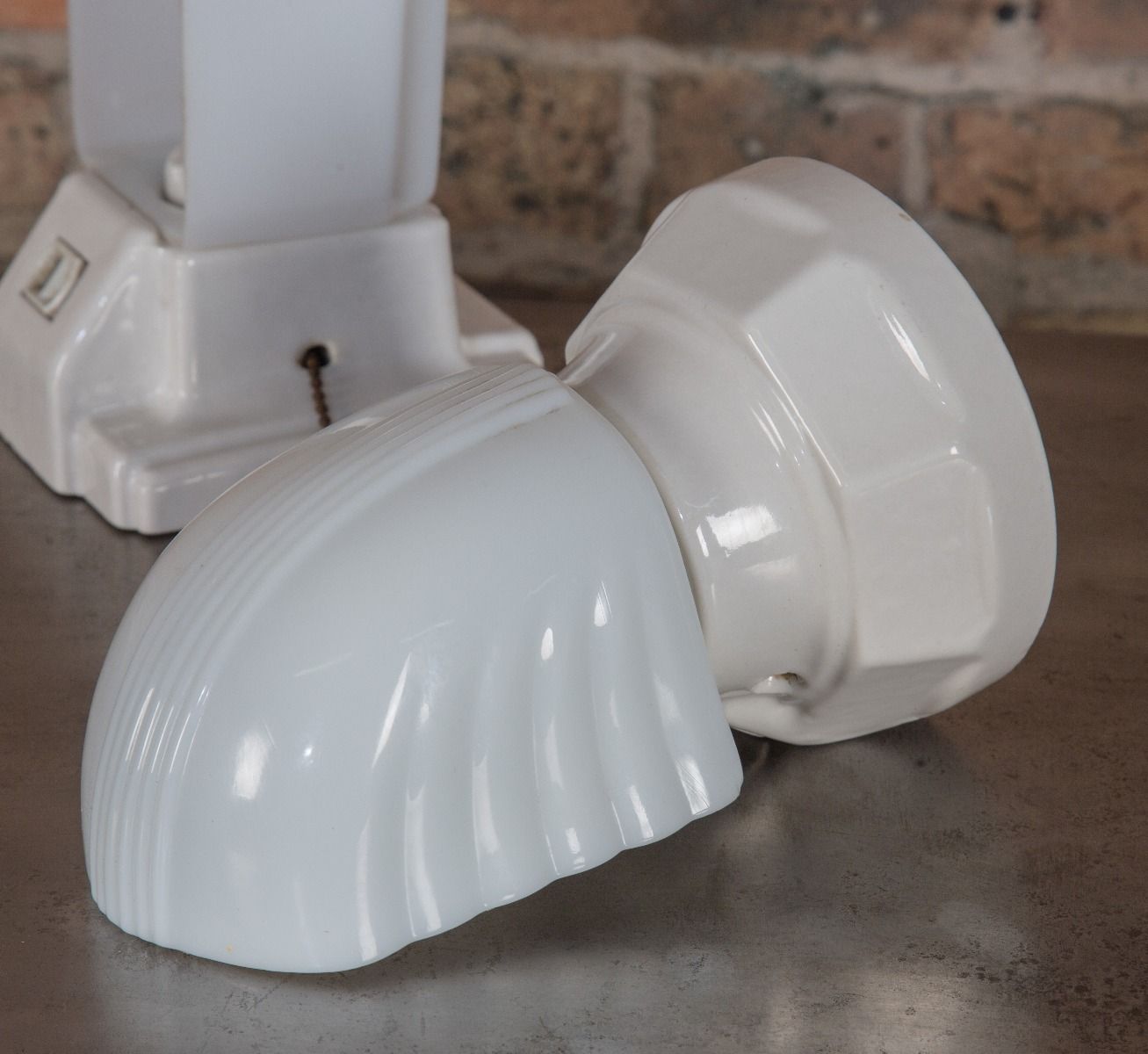 all original and highly desirable american art deco streamlined style hospital lavatory wall sconce with uniquely-designed shade