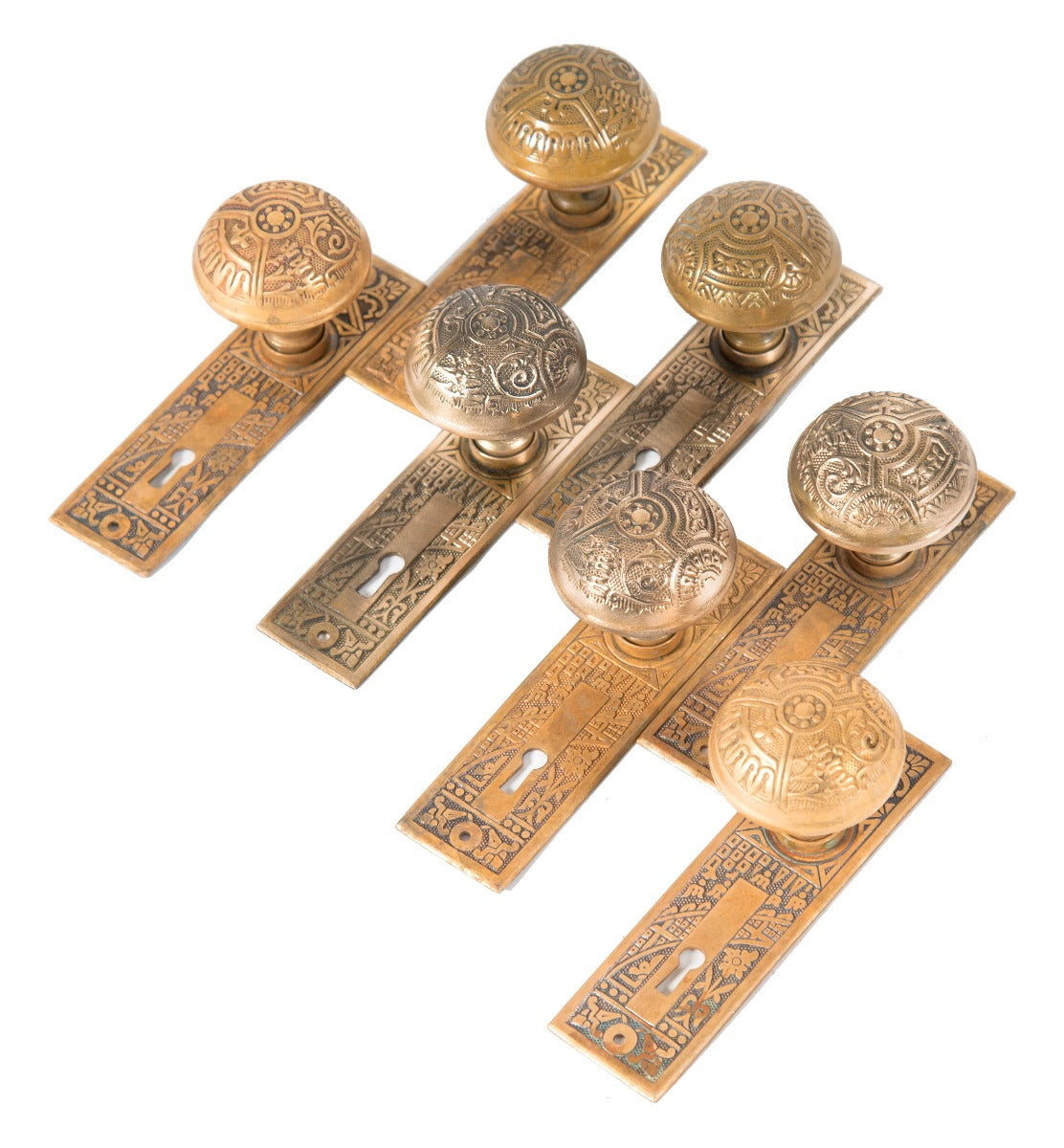 large lot of matching 19th century eastlake style salvaged chicago cast brass "ceylon" pattern passage door hardware