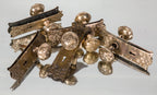 large lot of original early 20th century ornamental wrought brass salvaged chicago passage doorknob sets