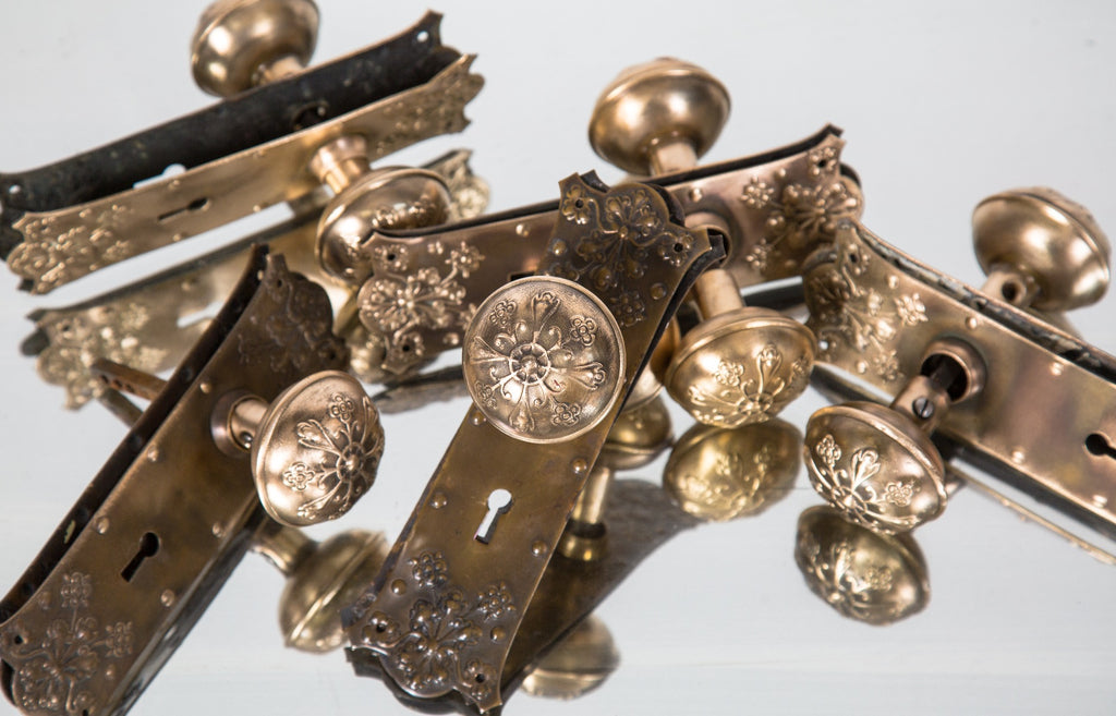 large lot of original early 20th century ornamental wrought brass salvaged chicago passage doorknob sets