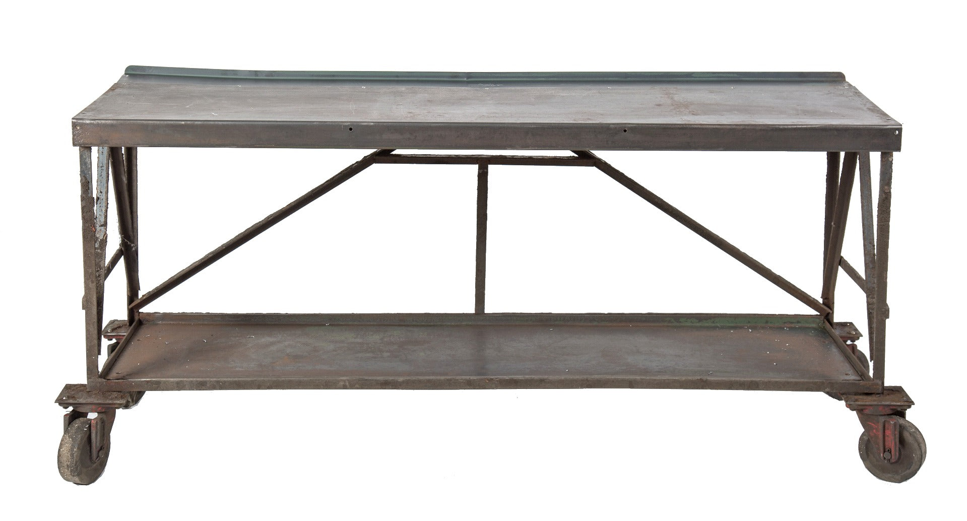 repurposed vintage american industrial long and narrow heavily reinforced welded joint factory table with casters