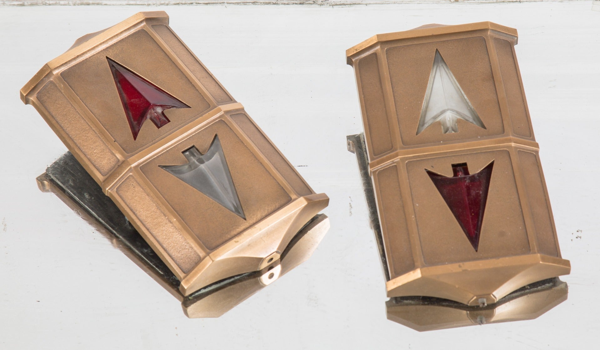 two matching original historically important interior national-foreman bank building lobby elevator indicators