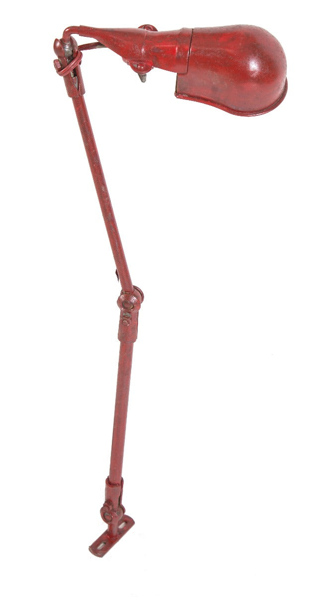 all original and fully functional triple-jointed weathered and worn red enameled fostoria factory machine shop bench lamp