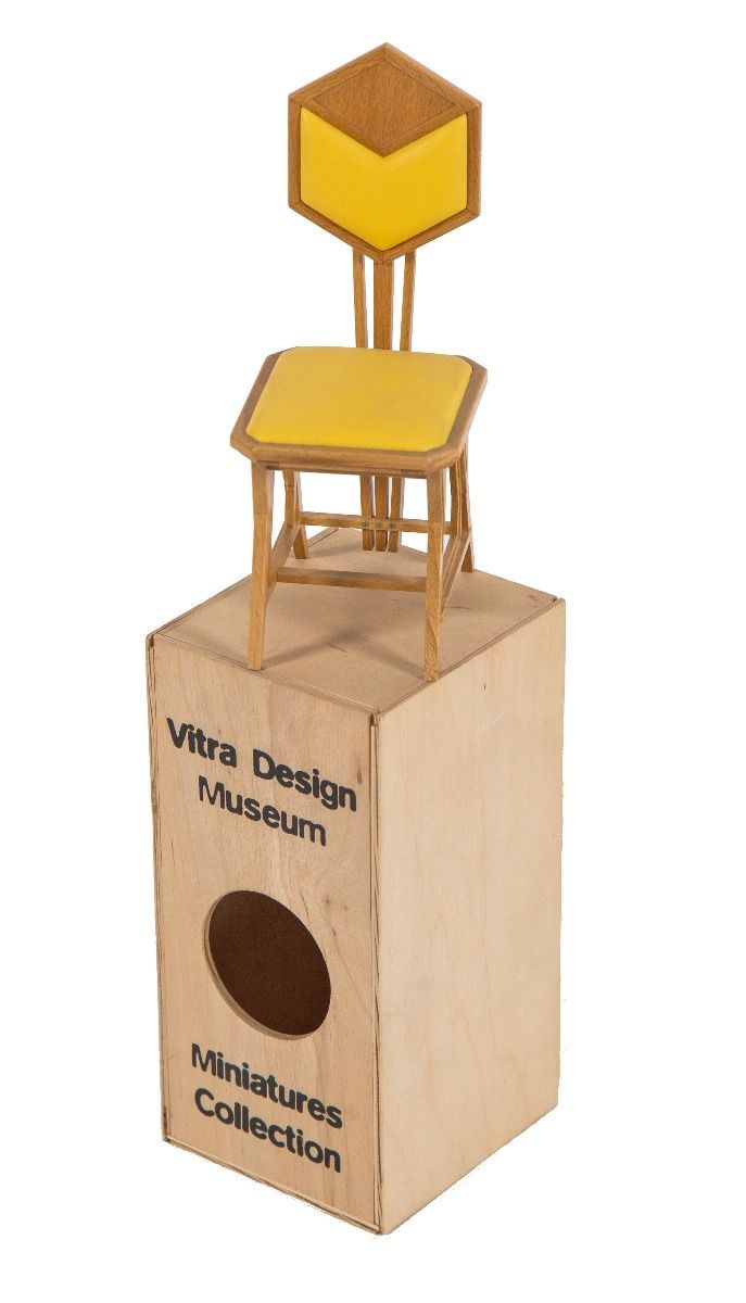 rare vitra miniature recreation of frank lloyd wright's yellow oil cloth "peacock" chair for imperial hotel
