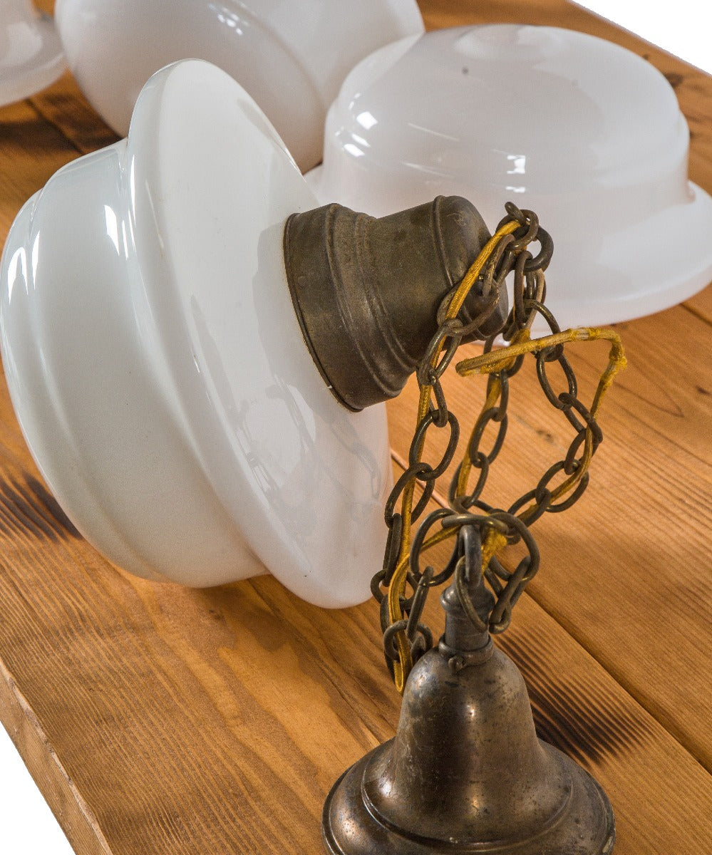 one of several all original early 20th century "schoolhouse" style single bulb pendant lights salvaged from a chicago public school