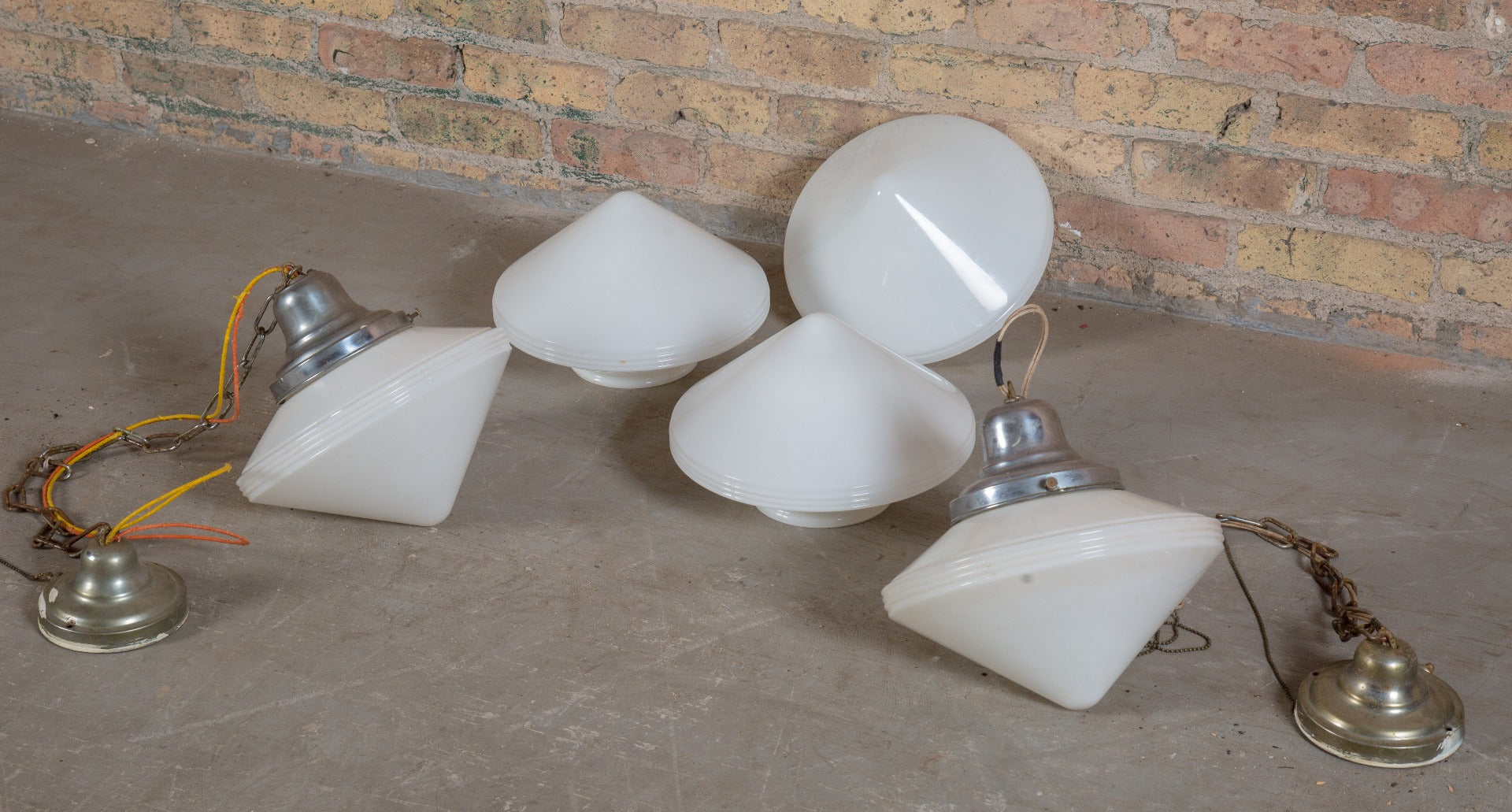 one of several matching salvaged chicago depression-era interior diner art deco style pendant light with oversized conical-shaped shades