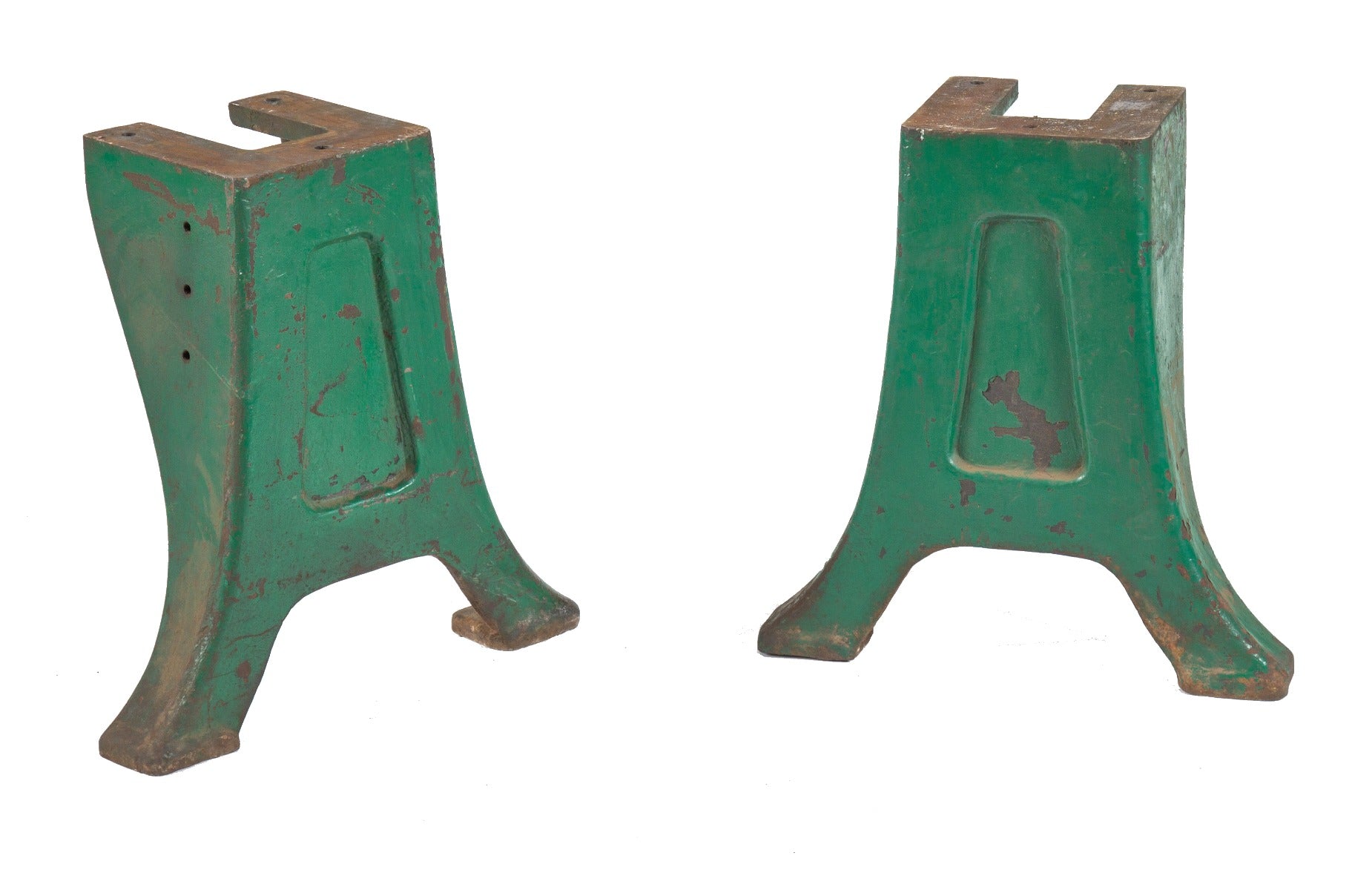 matching early 20th century low-lying heavy cast iron factory shop lathe machine bases with mostly uniform old green paint finish
