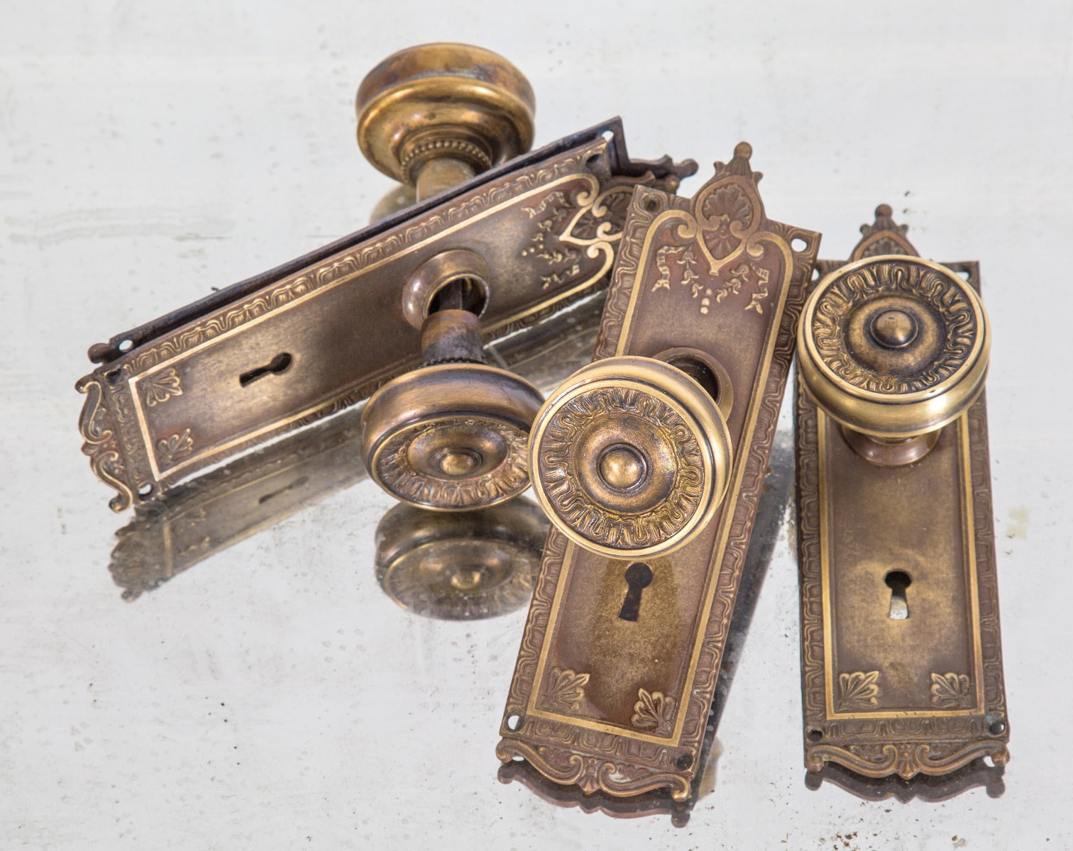 lot of matching 19th century antique american ornamental cast bronze "genoa" pattern interior residential passage door hardware