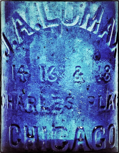 original and intact nineteenth century vibrant electric blue hutchinson shaped bottle with original patent spring stopper manufactured for chicago bottling giant j.a. lomax