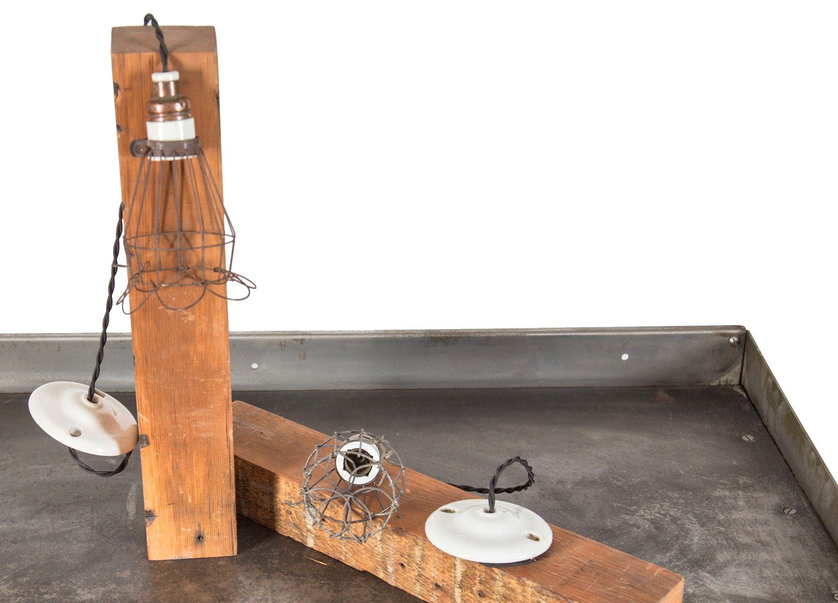 one of two rewired early 20th century salvaged chicago factory pendant lights with loxon expandable bottom bulb guards