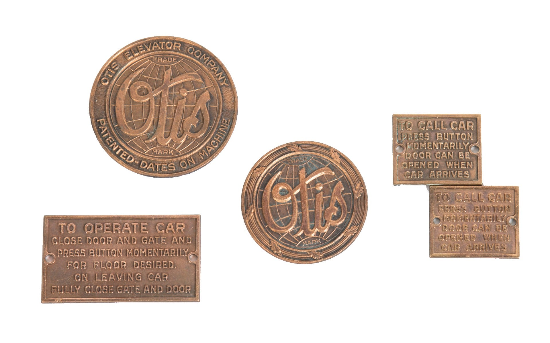 group of early 20th century antique american salvaged chicago cast brass wrigley chewing gum factory building elevator plaques