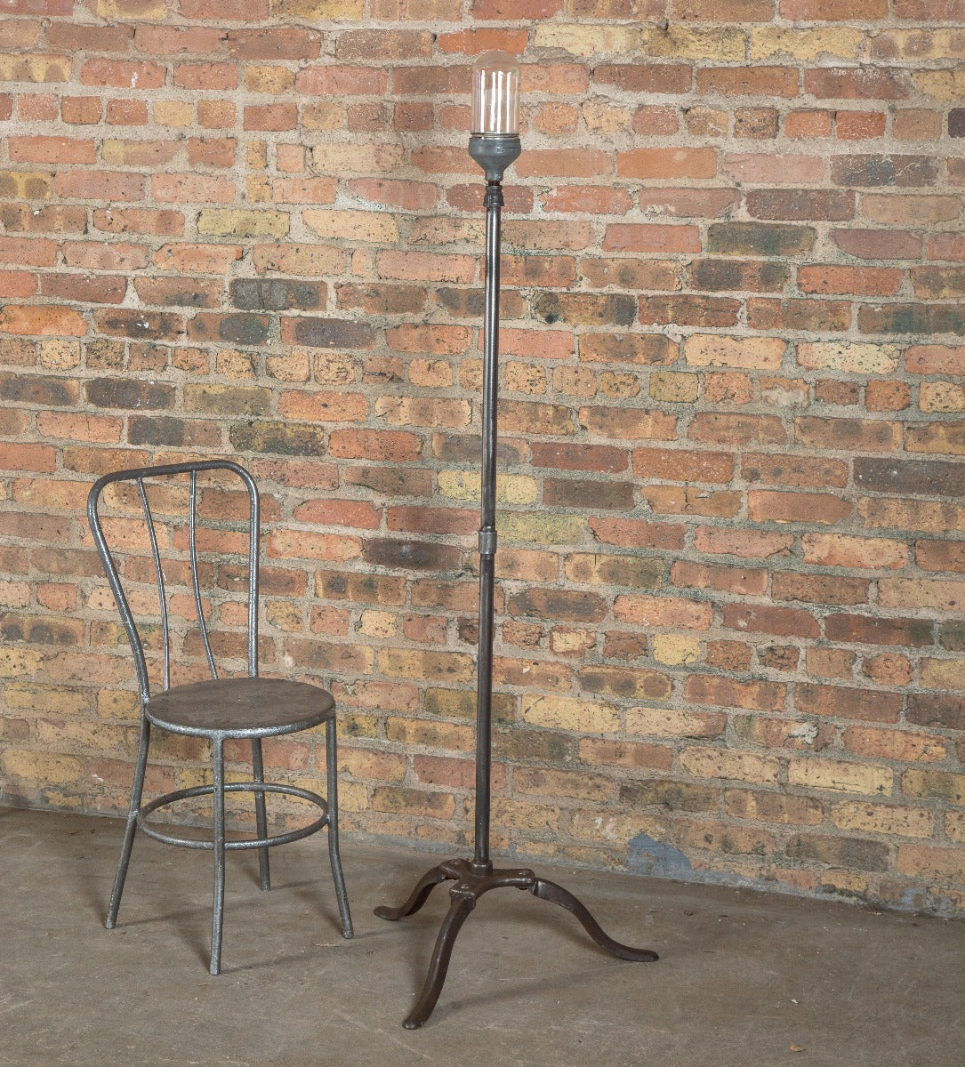 vintage american industrial freestanding theater stage "ghost light" with three legged brushed metal base