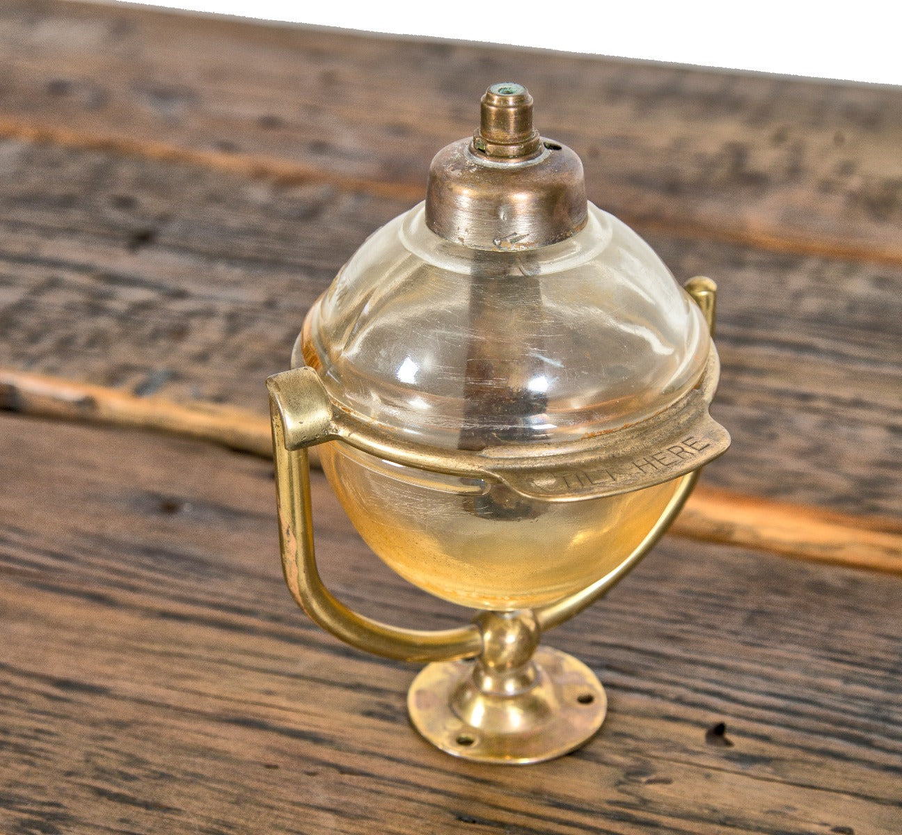 highly sought after all original and intact early 20th century brass-plated beau brummel soap dispenser