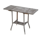 refinished diminutive four-legged pressed and folded steel "uhl art steel" typewriter stand with hinged leaves
