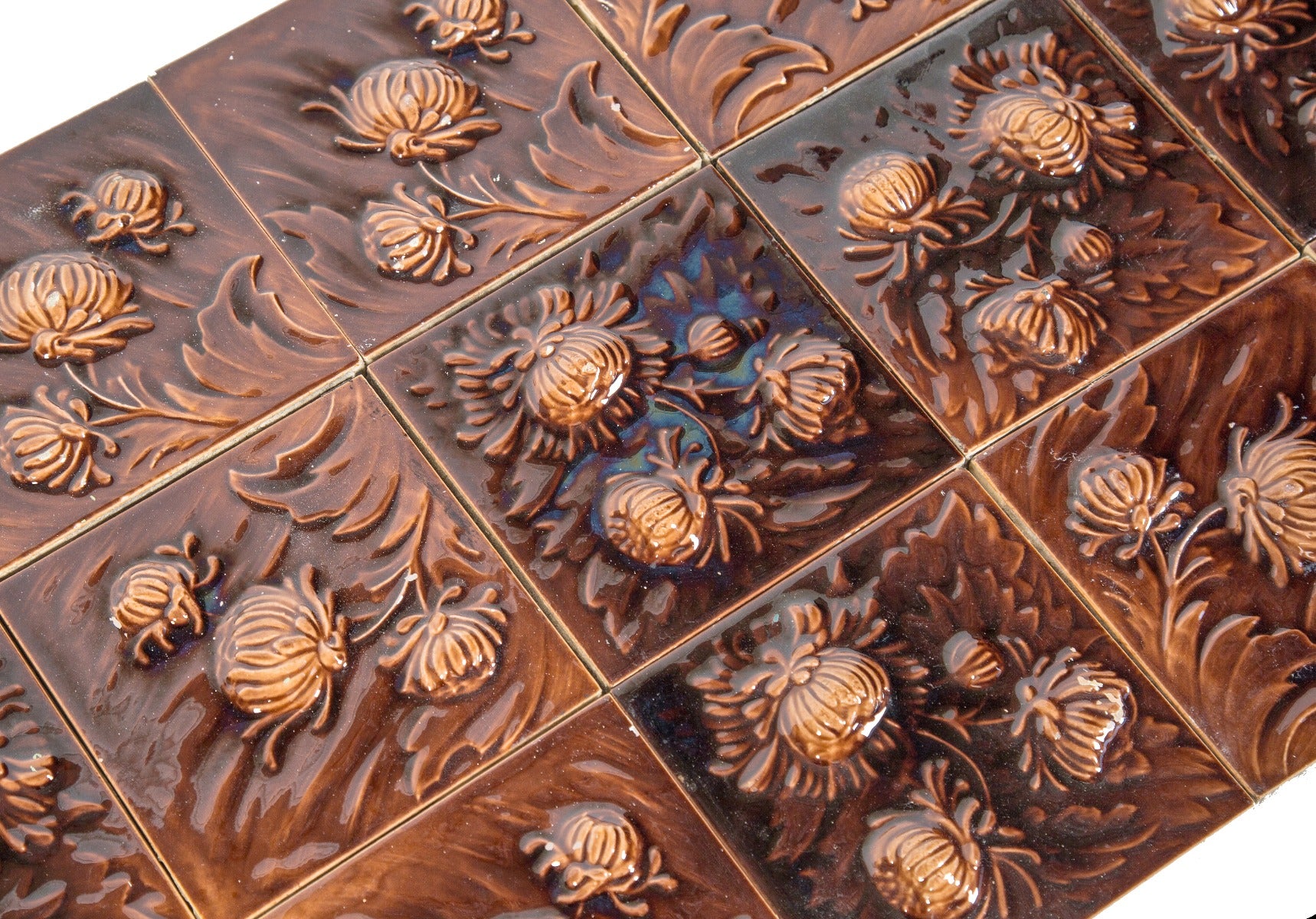 large lot of matching salvaged chicago richly colored majolica-glazed residential 6 x 6 fireplace tiles with deeply embossed floral motifs