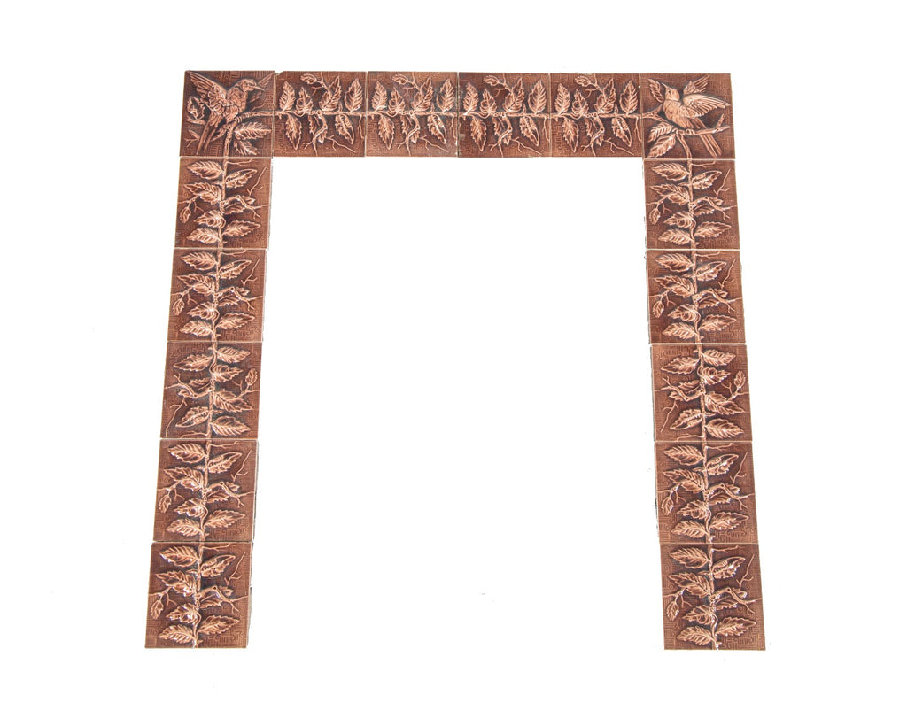 rare all original dark mauve majolica-glazed interior residential salvaged chicago fireplace tile surround with spread-winged bird corner tiles