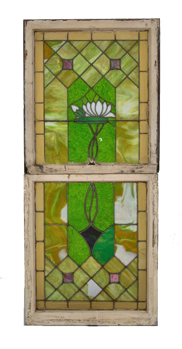 original and largely intact interior residential double-hung stained glass residential window with centrally located floral motif