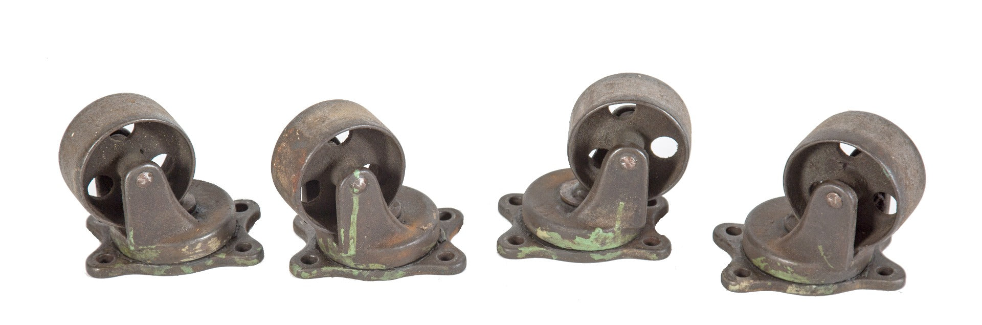 lot of four matching antique american industrial wrigley chewing gum factory cart bassick swivel casters with perforated wheels