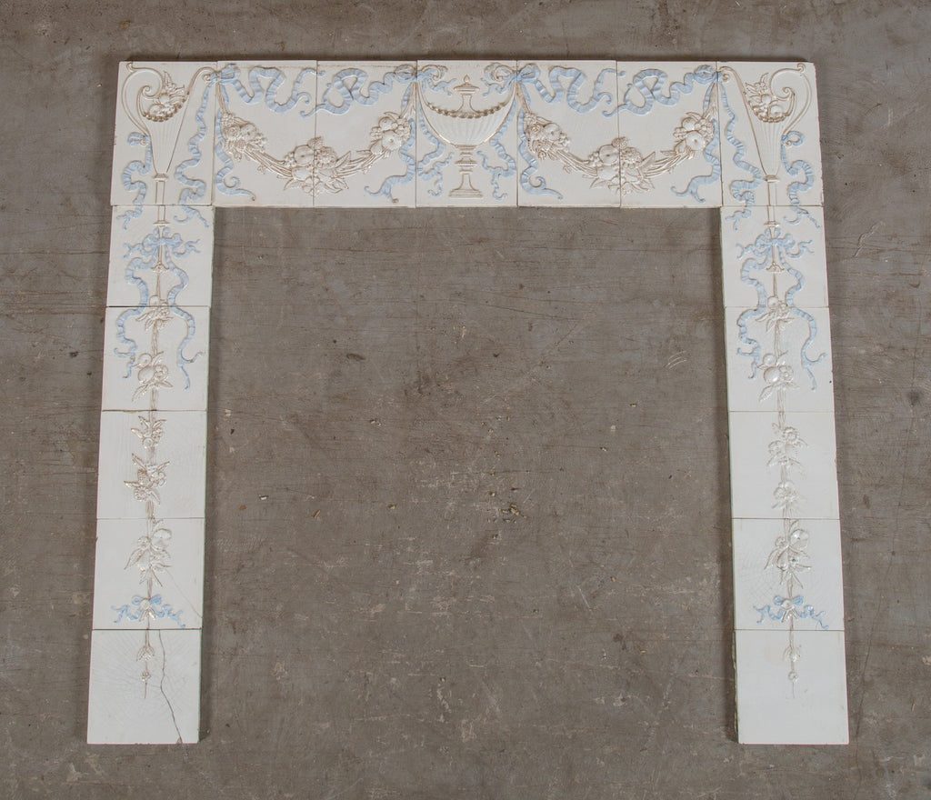 seldom found all original late 19th century antique american embossed white and blue glazed fireplace tile surround with gold accent
