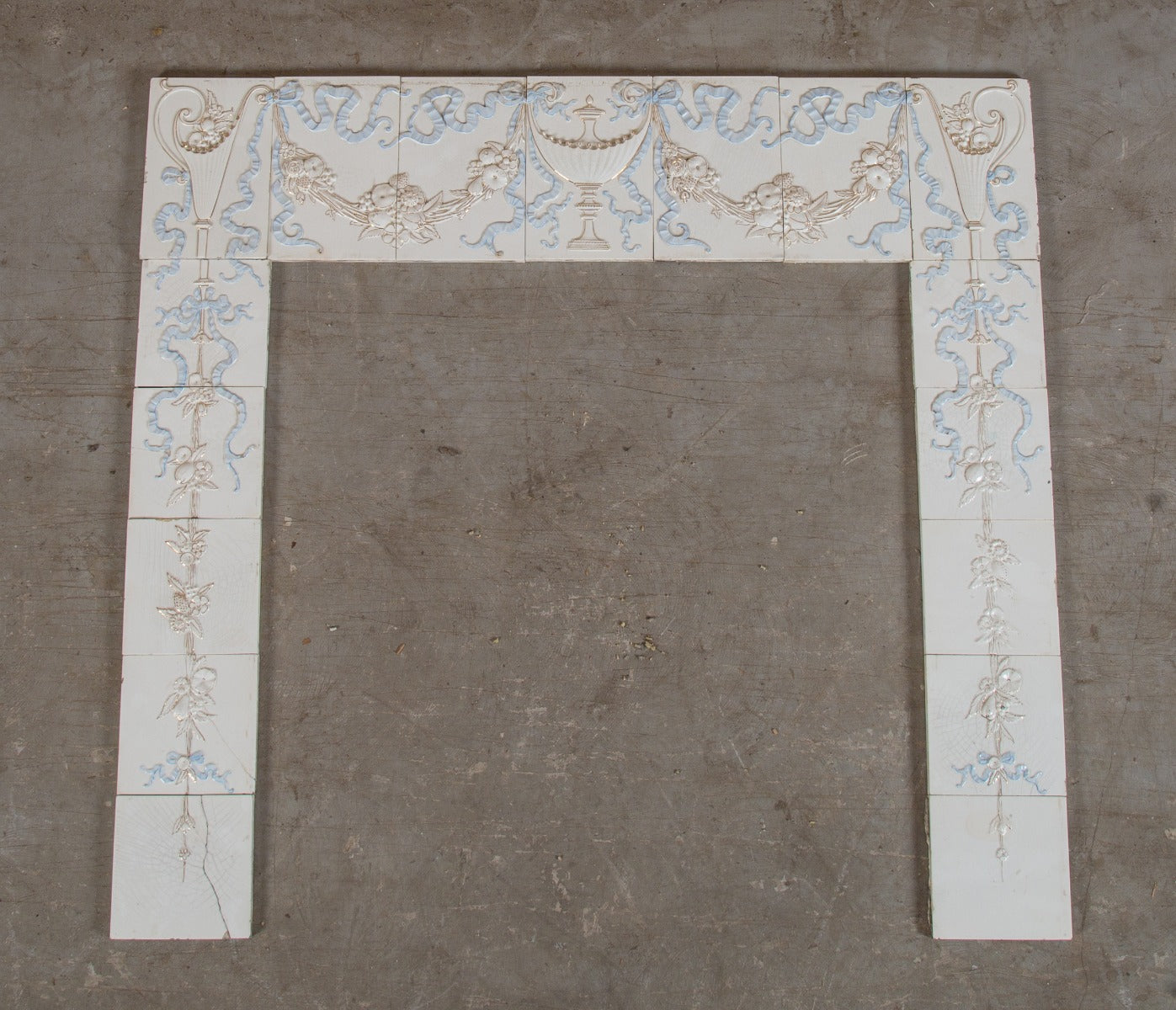 seldom found all original late 19th century antique american embossed white and blue glazed fireplace tile surround with gold accent