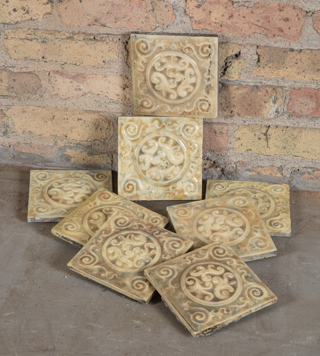 matching group of original 6 x 6 mottled finish embossed majolica tiles salvaged from a 19th century chicago residence