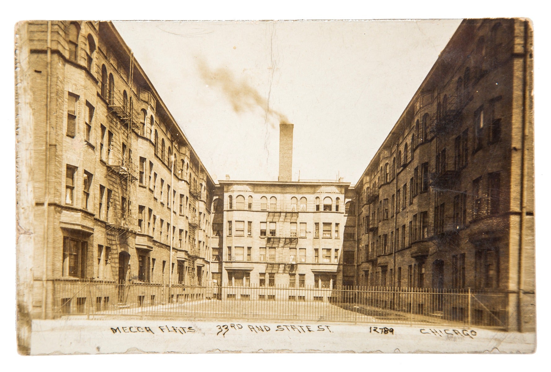 rare postmarked real photo post card of 1892 apartment complex mecca flats outdoor courtyard