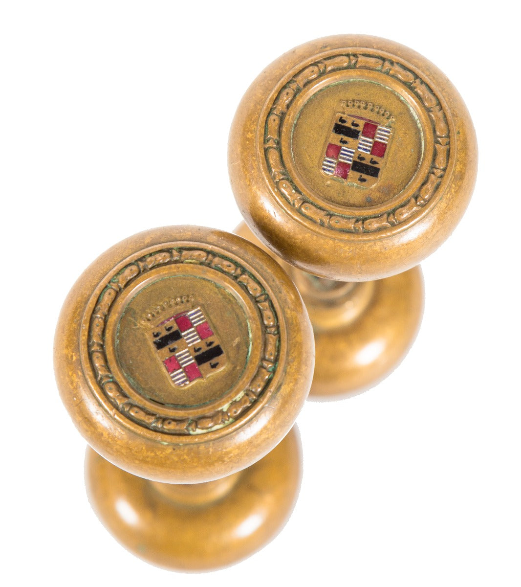 four matching original early 20th century emblematic book-cadillac hotel guestroom doorknobs with enameled accent