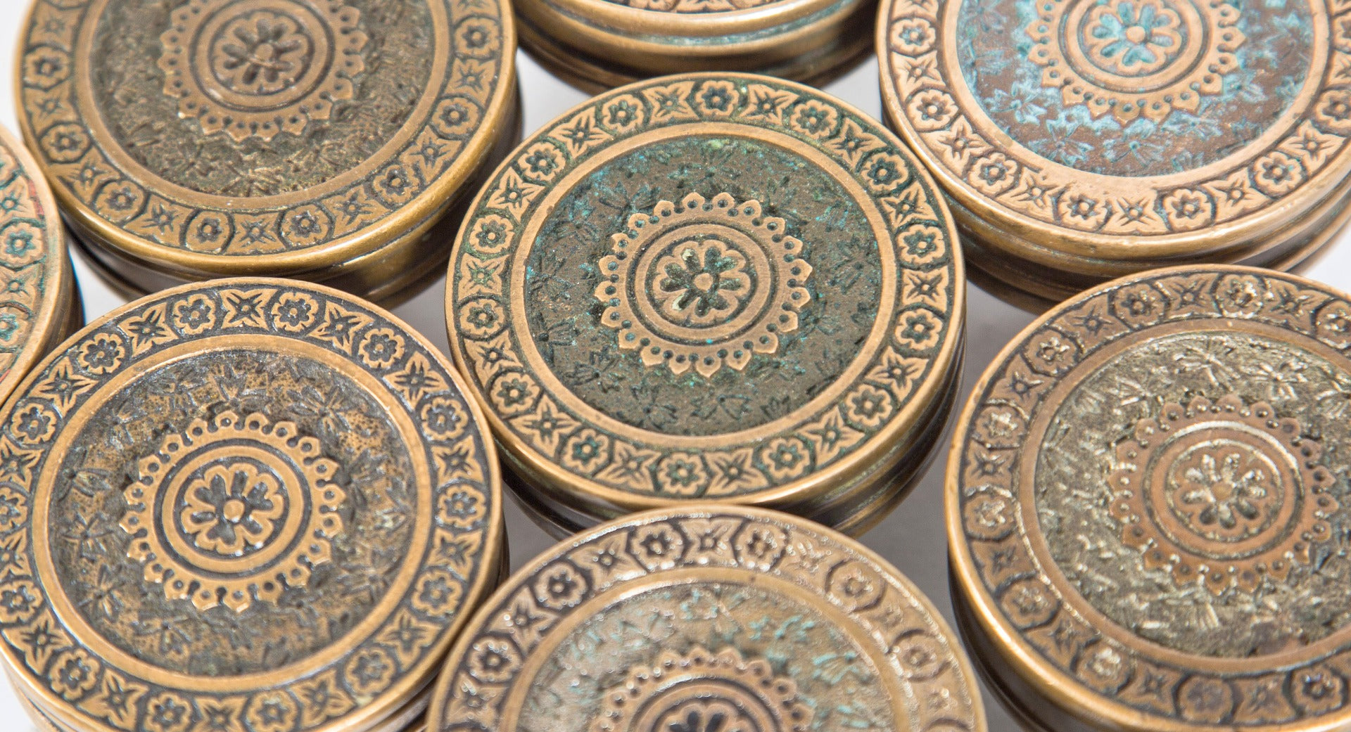 group of nine matching original 1880's salvaged minneapolis mansion interior passage door "ivy" handles