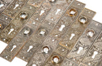 large lot of original matching 19th century american eastlake style "oriental" pattern residential passage door plates