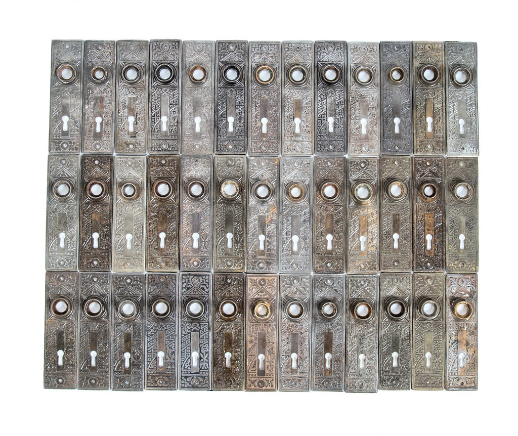 huge lot of original late 19th or early 20th century salvaged chicago "ceylon" pattern ornamental passage door backplates