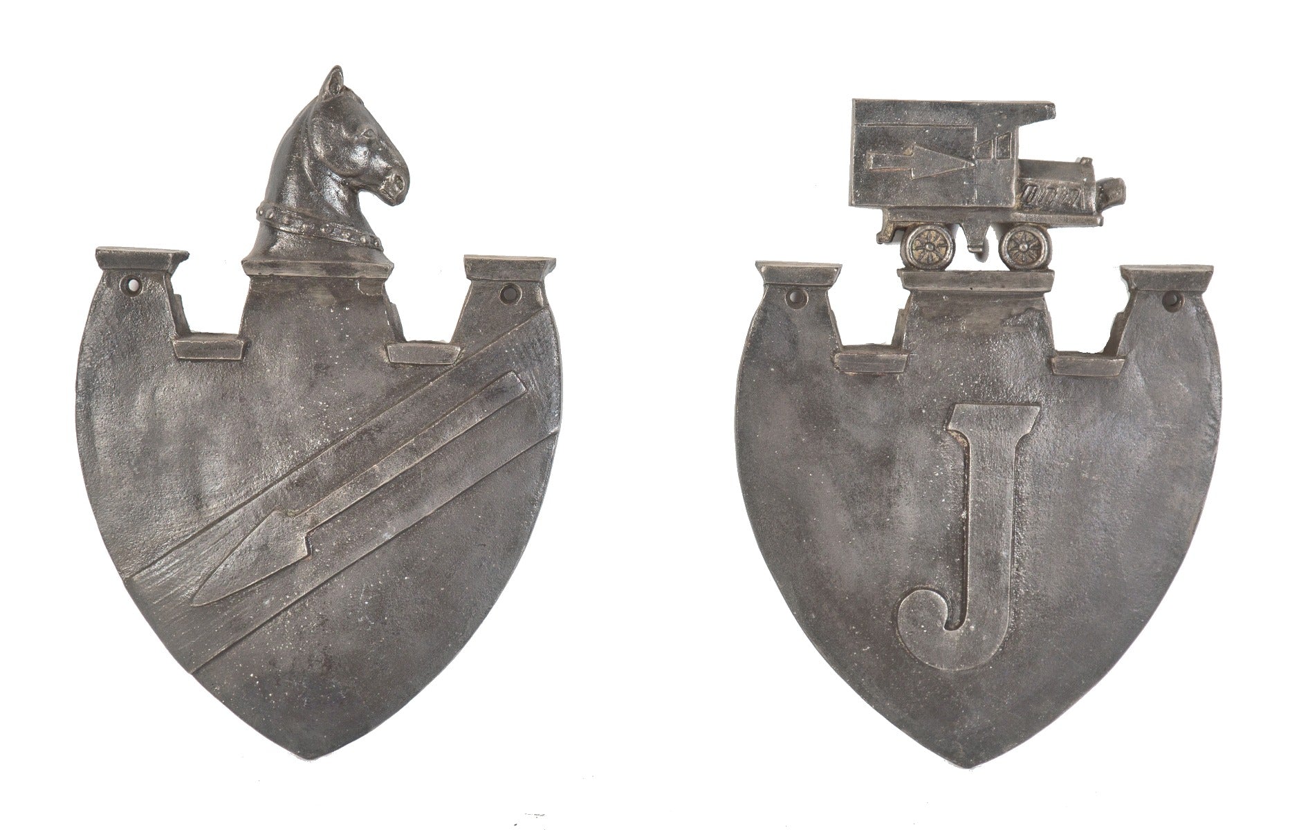 pair of original historically important depression-era salvaged chicago jackson's express and van company building figural plaques