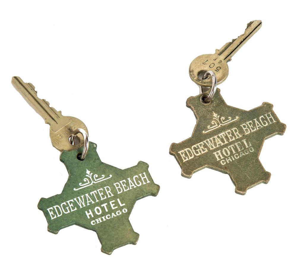 two nearly identical 1920's all original art deco salvaged chicago edgewater beach hotel guestroom key fobs