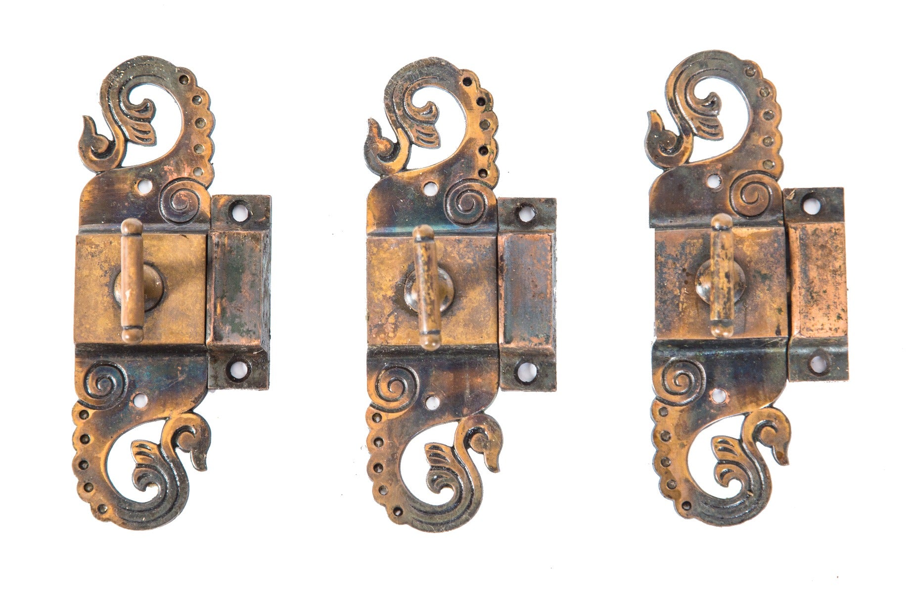 group of three matching original 19th century ornamental cast brass victorian cabinet door pulls with oxidized copper finish
