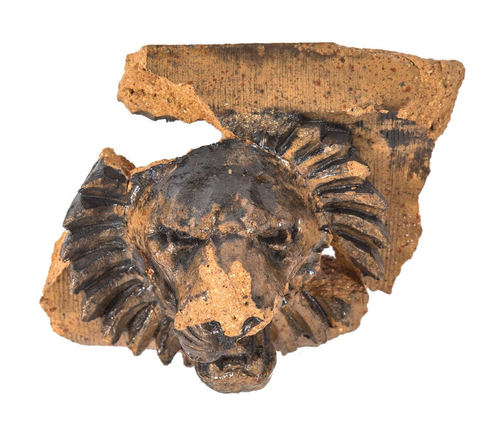 henry schlacks-designed speckled glazed salvaged terra cotta st. bonafice school lionhead fragment