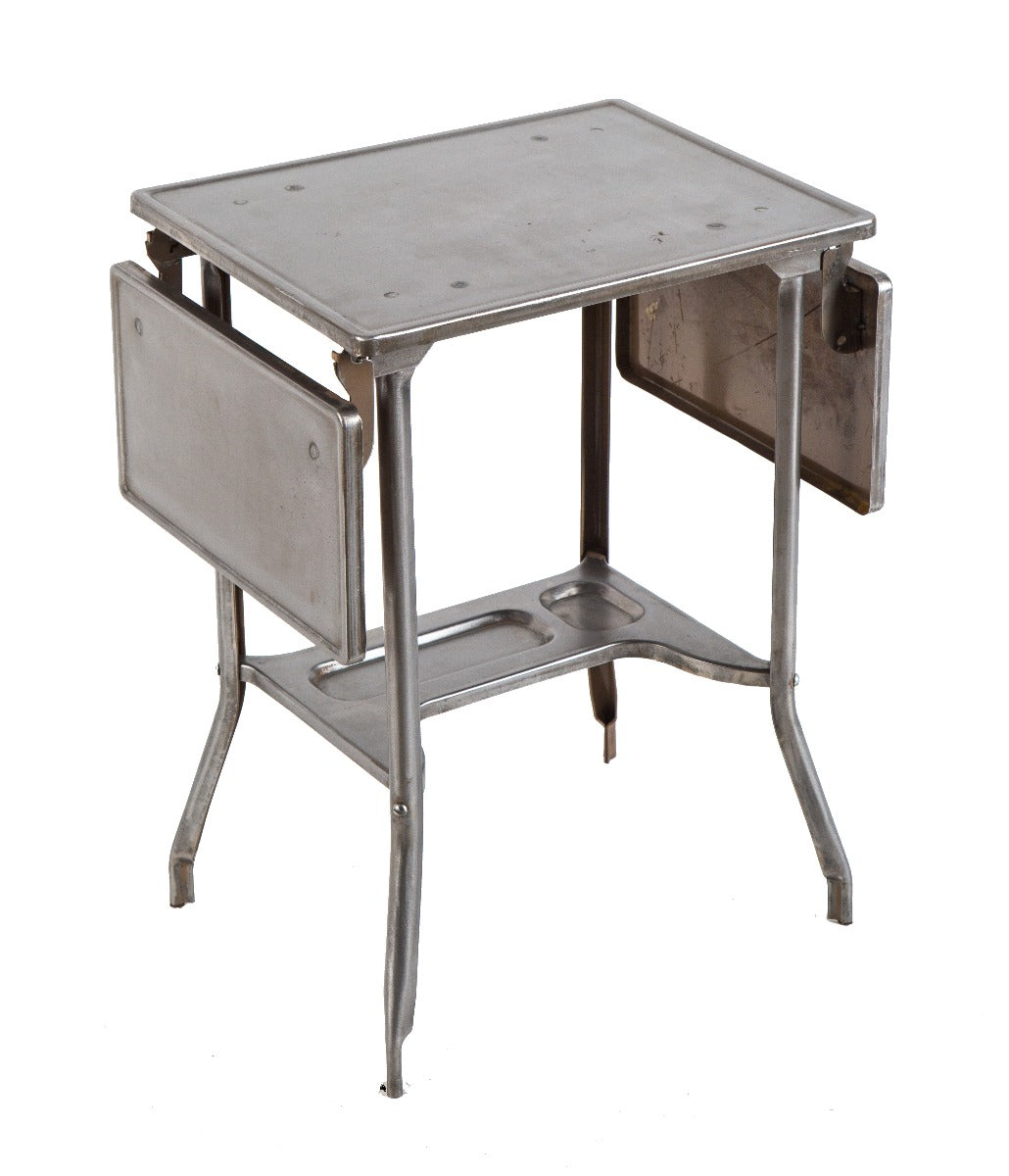 refinished diminutive four-legged pressed and folded steel "uhl art steel" typewriter stand with hinged leaves