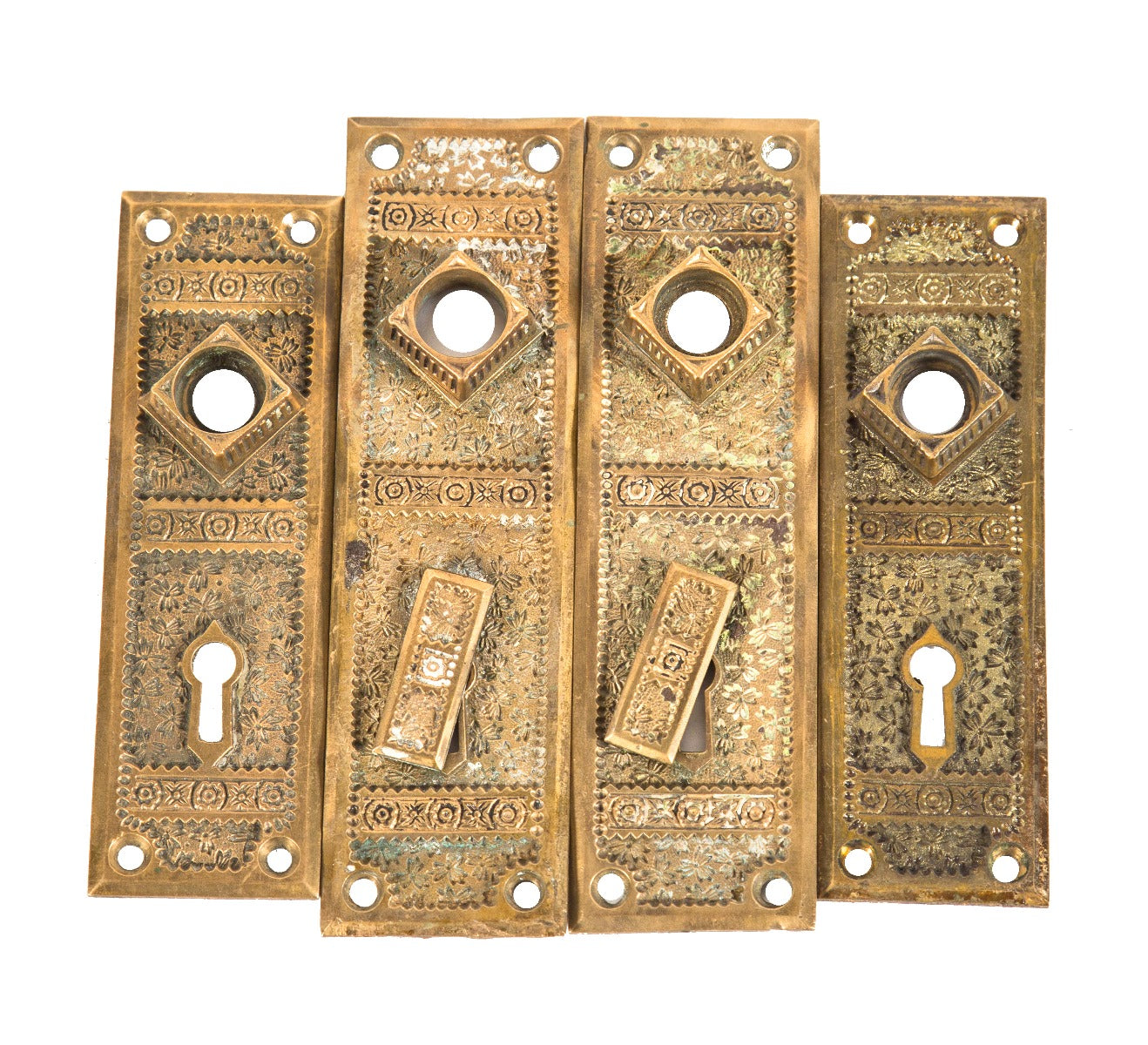 group of four salvaged chicago 1880's american eastlake style "ivy" pattern doorknob backplates with unique thimbles