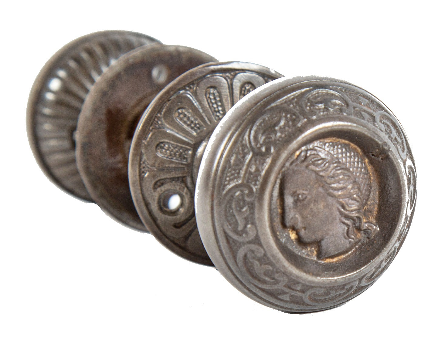 highly sought after original 1870's refinished ornamental cast iron figural "clara burton" doorknobs and matching escutcheons