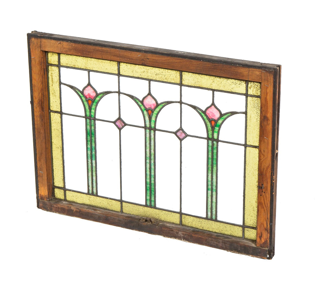 single early 20th century prairie style leaded glass window with three repeating abstract floral motifs with a rectilinear grid