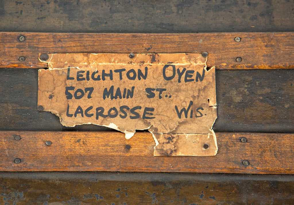 original nicely worn and weathered leighton oyen's personal travel steamer trunk with white stenciled name