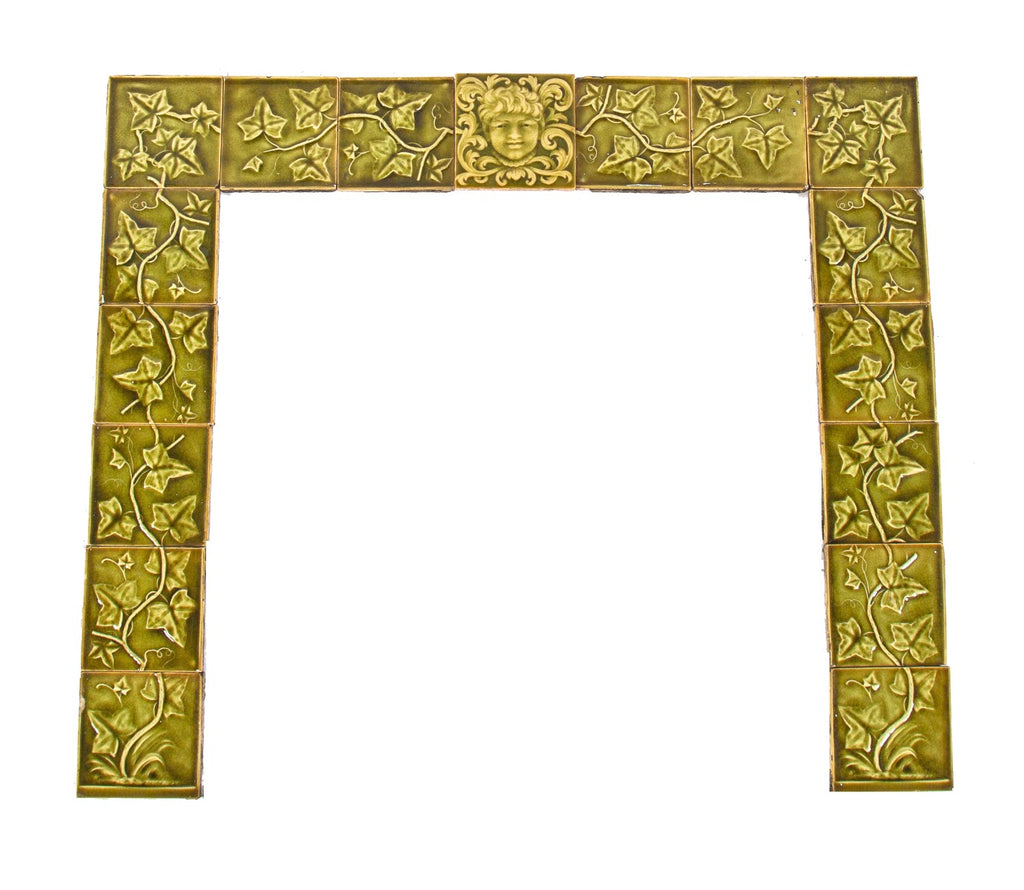 19th century richly colored antique american majolica olive green glazed residential tile surround with centrally located figure